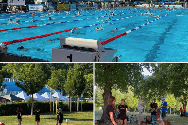 Schwimmbecken in Karlsruhe mit trainierenden Schwimmern, umgeben von Zuschauern und entspannenden Gruppen im Freien.